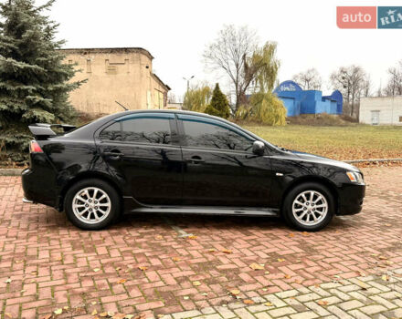 Черный Мицубиси Лансер, объемом двигателя 2 л и пробегом 169 тыс. км за 6800 $, фото 21 на Automoto.ua