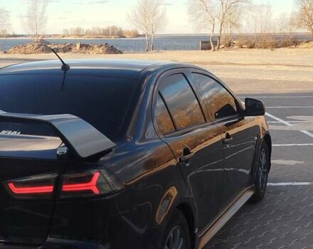 Чорний Міцубісі Lancer, об'ємом двигуна 2 л та пробігом 286 тис. км за 7950 $, фото 22 на Automoto.ua