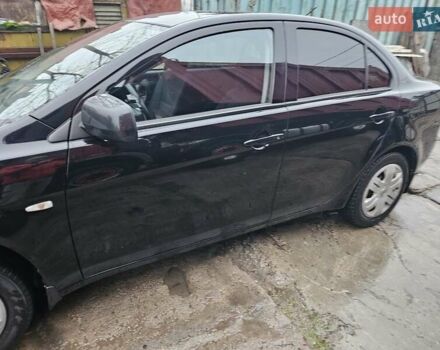 Черный Мицубиси Лансер, объемом двигателя 1.5 л и пробегом 222 тыс. км за 4900 $, фото 2 на Automoto.ua