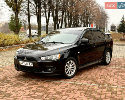 Черный Мицубиси Лансер, объемом двигателя 2 л и пробегом 169 тыс. км за 6800 $, фото 11 на Automoto.ua