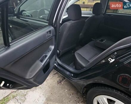 Черный Мицубиси Лансер, объемом двигателя 1.5 л и пробегом 222 тыс. км за 4900 $, фото 18 на Automoto.ua