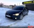 Черный Мицубиси Лансер, объемом двигателя 1.5 л и пробегом 230 тыс. км за 6499 $, фото 1 на Automoto.ua