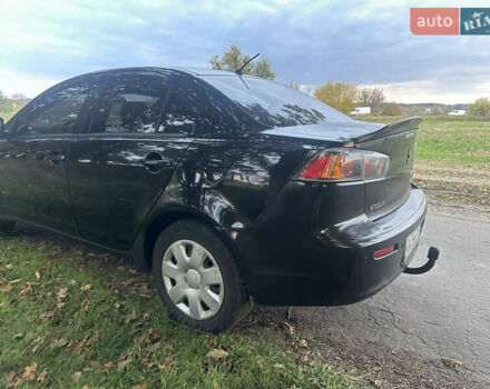 Черный Мицубиси Лансер, объемом двигателя 1.5 л и пробегом 202 тыс. км за 6500 $, фото 12 на Automoto.ua