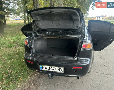 Черный Мицубиси Лансер, объемом двигателя 1.5 л и пробегом 202 тыс. км за 6500 $, фото 45 на Automoto.ua