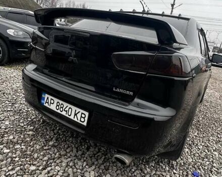 Черный Мицубиси Лансер, объемом двигателя 1.5 л и пробегом 250 тыс. км за 4800 $, фото 3 на Automoto.ua