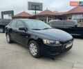 Черный Мицубиси Лансер, объемом двигателя 1.5 л и пробегом 162 тыс. км за 7000 $, фото 1 на Automoto.ua