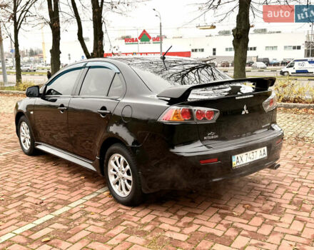 Черный Мицубиси Лансер, объемом двигателя 2 л и пробегом 169 тыс. км за 6800 $, фото 24 на Automoto.ua