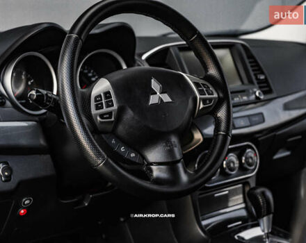 Чорний Міцубісі Lancer, об'ємом двигуна 2 л та пробігом 204 тис. км за 9500 $, фото 34 на Automoto.ua