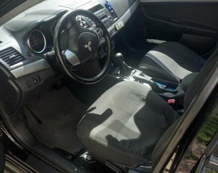 Мицубиси Лансер 2011 в Кропивницком (Кировограде) на Automoto.ua Черный Мицубиси Лансер, объемом двигателя 1.5 л и пробегом 150 тыс. км за 7000 $, фото 4 на Automoto.ua