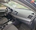 Черный Мицубиси Лансер, объемом двигателя 1.5 л и пробегом 190 тыс. км за 5999 $, фото 2 на Automoto.ua