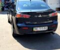 Черный Мицубиси Лансер, объемом двигателя 1.5 л и пробегом 90 тыс. км за 8500 $, фото 1 на Automoto.ua