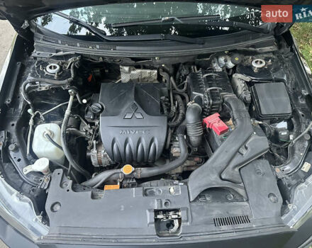 Черный Мицубиси Лансер, объемом двигателя 1.5 л и пробегом 202 тыс. км за 6500 $, фото 44 на Automoto.ua