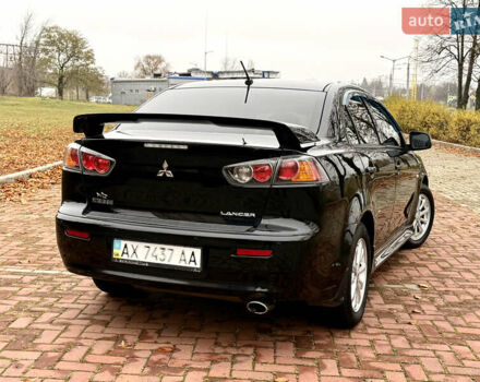 Черный Мицубиси Лансер, объемом двигателя 2 л и пробегом 169 тыс. км за 6800 $, фото 6 на Automoto.ua