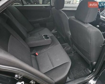 Черный Мицубиси Лансер, объемом двигателя 1.5 л и пробегом 222 тыс. км за 4900 $, фото 16 на Automoto.ua