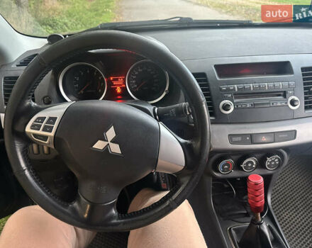 Черный Мицубиси Лансер, объемом двигателя 1.5 л и пробегом 202 тыс. км за 6500 $, фото 34 на Automoto.ua