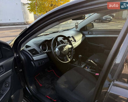 Мицубиси Лансер 2011 в Полтаве на Automoto.ua Черный Мицубиси Лансер, объемом двигателя 1.5 л и пробегом 246 тыс. км за 6300 $, фото 6 на Automoto.ua