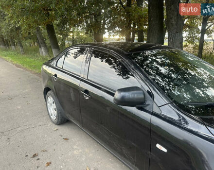 Черный Мицубиси Лансер, объемом двигателя 1.5 л и пробегом 202 тыс. км за 6500 $, фото 19 на Automoto.ua