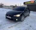Черный Мицубиси Лансер, объемом двигателя 1.5 л и пробегом 235 тыс. км за 6500 $, фото 1 на Automoto.ua