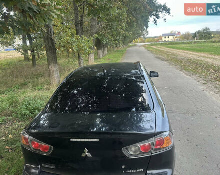 Черный Мицубиси Лансер, объемом двигателя 1.5 л и пробегом 202 тыс. км за 6500 $, фото 25 на Automoto.ua