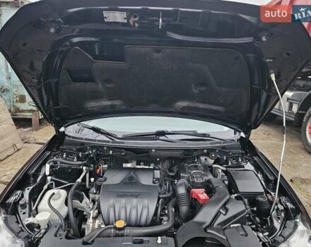 Черный Мицубиси Лансер, объемом двигателя 1.5 л и пробегом 222 тыс. км за 4900 $, фото 9 на Automoto.ua