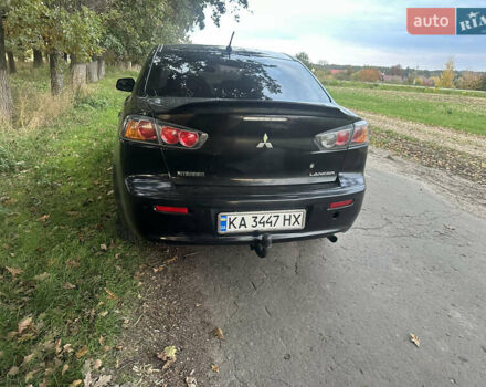 Черный Мицубиси Лансер, объемом двигателя 1.5 л и пробегом 202 тыс. км за 6500 $, фото 15 на Automoto.ua