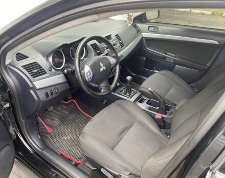 Міцубісі Lancer 2011 у Полтаві на Automoto.ua Чорний Міцубісі Lancer, об'ємом двигуна 1.5 л та пробігом 240 тис. км за 6300 $, фото 3 на Automoto.ua
