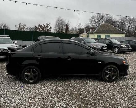 Черный Мицубиси Лансер, объемом двигателя 1.5 л и пробегом 250 тыс. км за 4800 $, фото 6 на Automoto.ua