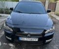 Чорний Міцубісі Lancer, об'ємом двигуна 1.5 л та пробігом 240 тис. км за 7000 $, фото 1 на Automoto.ua