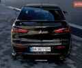 Чорний Міцубісі Lancer, об'ємом двигуна 2 л та пробігом 204 тис. км за 9500 $, фото 1 на Automoto.ua