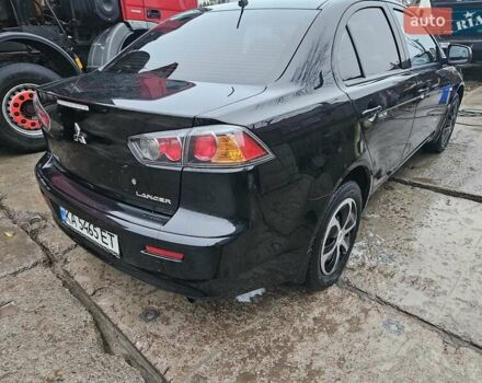 Черный Мицубиси Лансер, объемом двигателя 1.5 л и пробегом 222 тыс. км за 4900 $, фото 6 на Automoto.ua