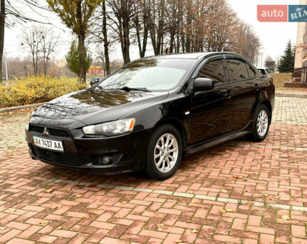 Черный Мицубиси Лансер, объемом двигателя 2 л и пробегом 169 тыс. км за 6800 $, фото 2 на Automoto.ua