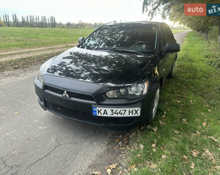 Черный Мицубиси Лансер, объемом двигателя 1.5 л и пробегом 202 тыс. км за 6500 $, фото 2 на Automoto.ua