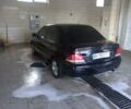 Чорний Міцубісі Lancer, об'ємом двигуна 1.6 л та пробігом 150 тис. км за 7500 $, фото 1 на Automoto.ua
