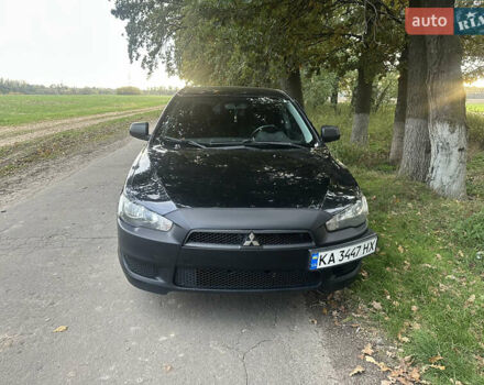 Черный Мицубиси Лансер, объемом двигателя 1.5 л и пробегом 202 тыс. км за 6500 $, фото 1 на Automoto.ua