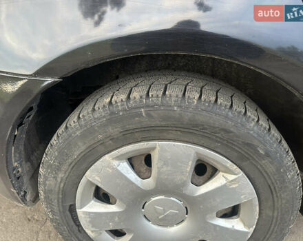 Черный Мицубиси Лансер, объемом двигателя 1.5 л и пробегом 202 тыс. км за 6500 $, фото 21 на Automoto.ua