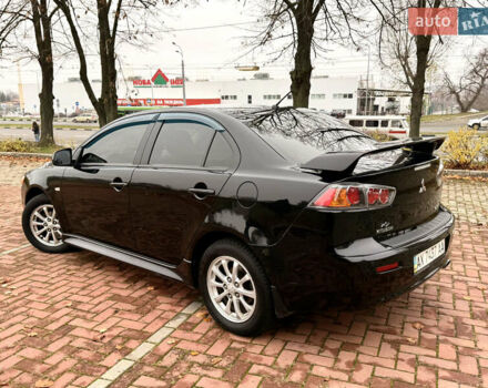 Черный Мицубиси Лансер, объемом двигателя 2 л и пробегом 169 тыс. км за 6800 $, фото 16 на Automoto.ua