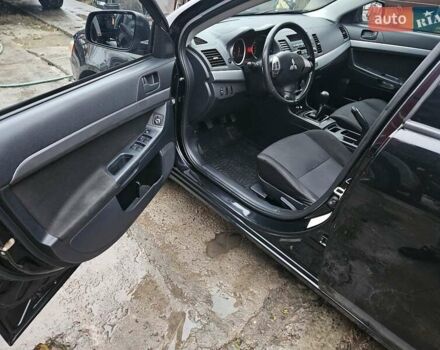 Черный Мицубиси Лансер, объемом двигателя 1.5 л и пробегом 222 тыс. км за 4900 $, фото 20 на Automoto.ua