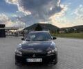 Чорний Міцубісі Lancer, об'ємом двигуна 2 л та пробігом 184 тис. км за 7000 $, фото 1 на Automoto.ua