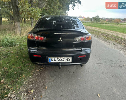 Черный Мицубиси Лансер, объемом двигателя 1.5 л и пробегом 202 тыс. км за 6500 $, фото 11 на Automoto.ua