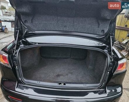 Черный Мицубиси Лансер, объемом двигателя 1.5 л и пробегом 222 тыс. км за 4900 $, фото 25 на Automoto.ua