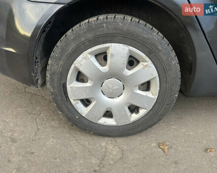 Черный Мицубиси Лансер, объемом двигателя 1.5 л и пробегом 202 тыс. км за 6500 $, фото 26 на Automoto.ua