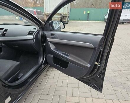 Чорний Міцубісі Lancer, об'ємом двигуна 1.5 л та пробігом 223 тис. км за 5500 $, фото 22 на Automoto.ua