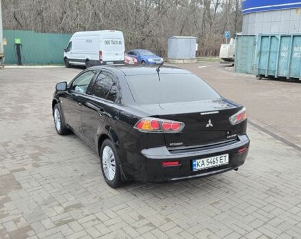 Черный Мицубиси Лансер, объемом двигателя 2 л и пробегом 223 тыс. км за 5500 $, фото 3 на Automoto.ua