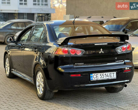 Черный Мицубиси Лансер, объемом двигателя 1.59 л и пробегом 186 тыс. км за 7300 $, фото 23 на Automoto.ua