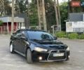 Черный Мицубиси Лансер, объемом двигателя 1.59 л и пробегом 146 тыс. км за 8450 $, фото 56 на Automoto.ua