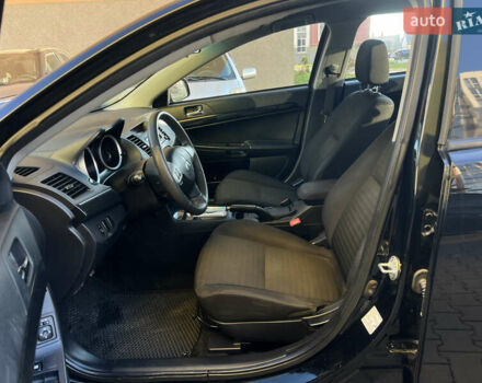 Черный Мицубиси Лансер, объемом двигателя 1.59 л и пробегом 186 тыс. км за 7300 $, фото 14 на Automoto.ua