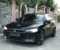Черный Мицубиси Лансер, объемом двигателя 1.6 л и пробегом 200 тыс. км за 7200 $, фото 1 на Automoto.ua
