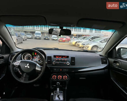 Черный Мицубиси Лансер, объемом двигателя 1.59 л и пробегом 186 тыс. км за 7300 $, фото 21 на Automoto.ua