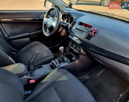 Чорний Міцубісі Lancer, об'ємом двигуна 1.59 л та пробігом 191 тис. км за 5900 $, фото 12 на Automoto.ua