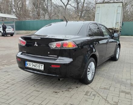 Черный Мицубиси Лансер, объемом двигателя 2 л и пробегом 223 тыс. км за 5500 $, фото 4 на Automoto.ua